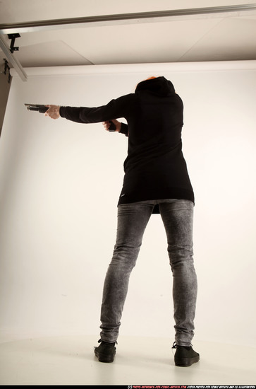 Woman Adult Athletic White Standing poses Casual Fighting with shotgun