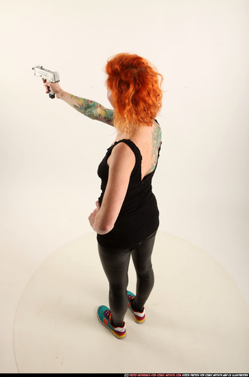 Woman Adult Athletic White Fighting with submachine gun Standing poses Casual