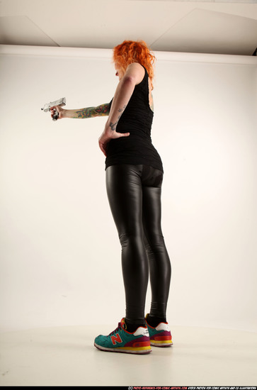 Woman Adult Athletic White Fighting with submachine gun Standing poses Casual