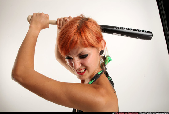 Woman Adult Athletic White Standing poses Casual Fighting with bat