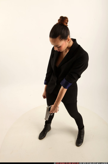 Woman Young Athletic White Fighting with gun Standing poses Business