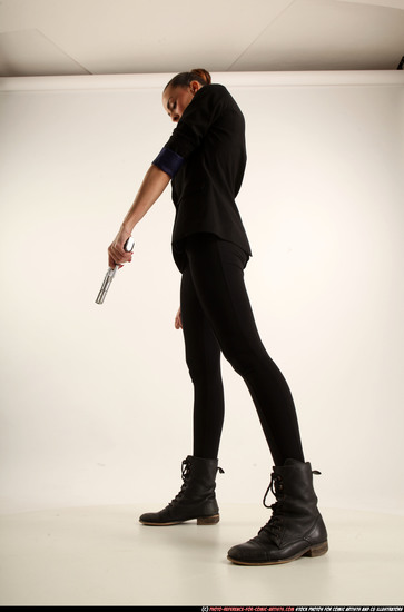 Woman Young Athletic White Fighting with gun Standing poses Business