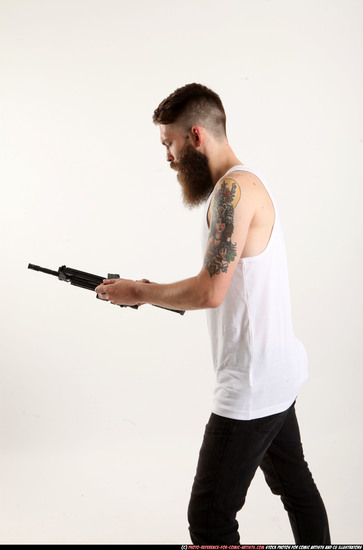 Man Adult Athletic White Reloading weapon Standing poses Sportswear