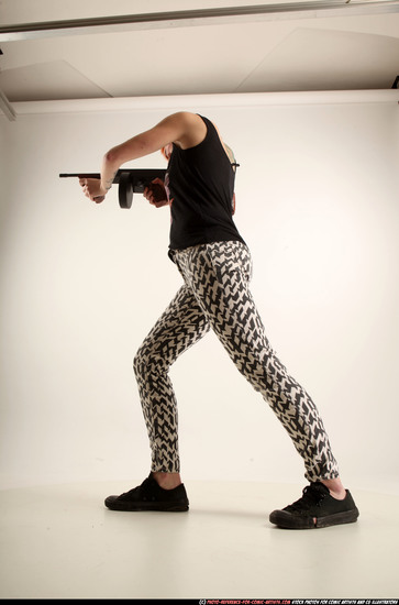 Woman Adult Athletic White Fighting with submachine gun Standing poses Casual