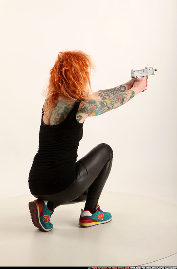 Woman Adult Athletic White Fighting with submachine gun Kneeling poses Casual