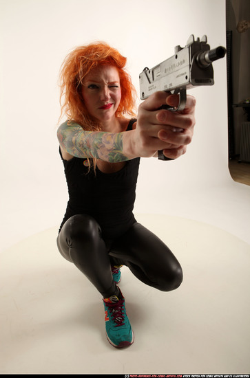 Woman Adult Athletic White Fighting with submachine gun Kneeling poses Casual