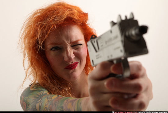 Woman Adult Athletic White Fighting with submachine gun Kneeling poses Casual