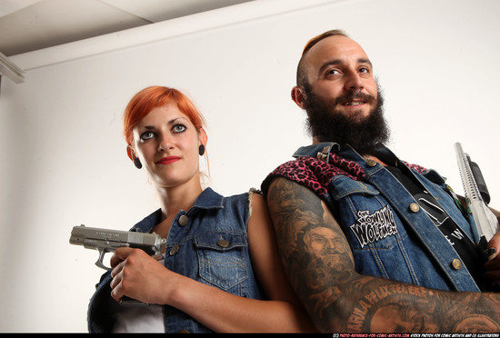 Man & Woman Adult Athletic White Fighting with gun Standing poses Casual