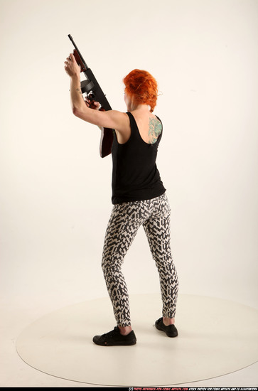 Woman Adult Athletic White Fighting with submachine gun Standing poses Casual