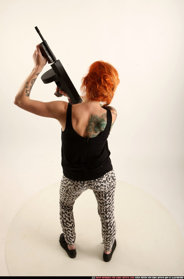 Woman Adult Athletic White Fighting with submachine gun Standing poses Casual