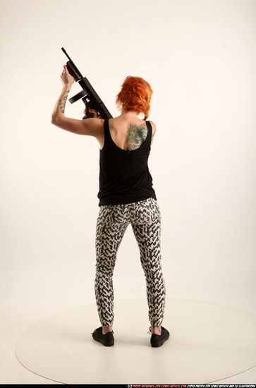 Woman Adult Athletic White Fighting with submachine gun Standing poses Casual