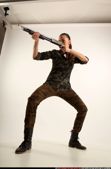 Woman Young Athletic White Standing poses Army Fighting with shotgun