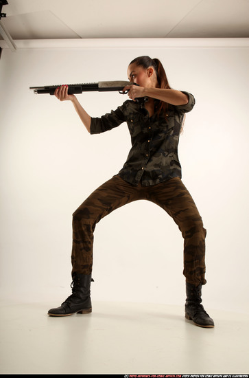 Woman Young Athletic White Standing poses Army Fighting with shotgun