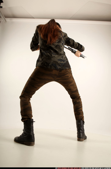 Woman Young Athletic White Standing poses Army Fighting with shotgun