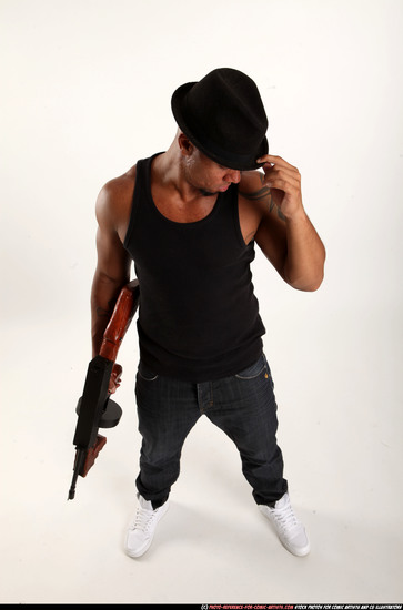 Man Adult Athletic Black Fighting with submachine gun Standing poses Casual