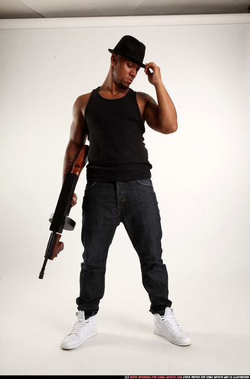 Man Adult Athletic Black Fighting with submachine gun Standing poses Casual