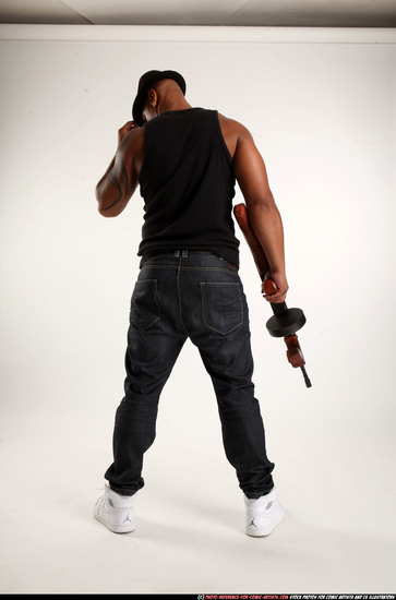 Man Adult Athletic Black Fighting with submachine gun Standing poses Casual