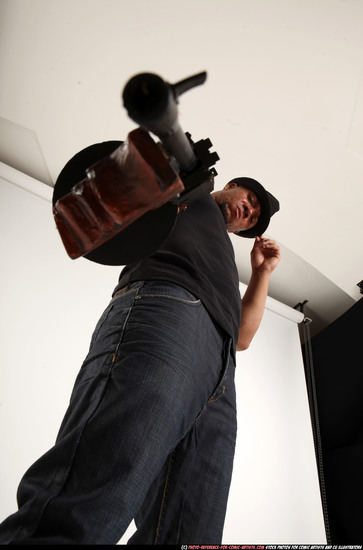 Man Adult Athletic Black Fighting with submachine gun Standing poses Casual