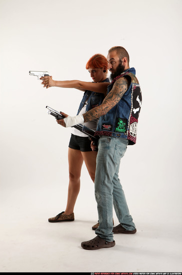 Man & Woman Adult Athletic White Fighting with gun Standing poses Casual