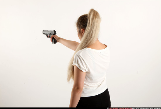 Woman Young Average Fighting with gun Standing poses Casual Asian