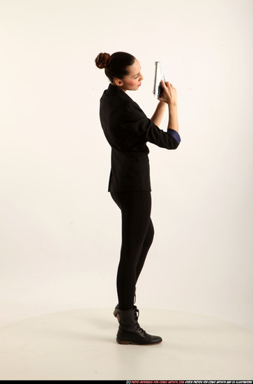 Woman Young Athletic White Fighting with gun Standing poses Business