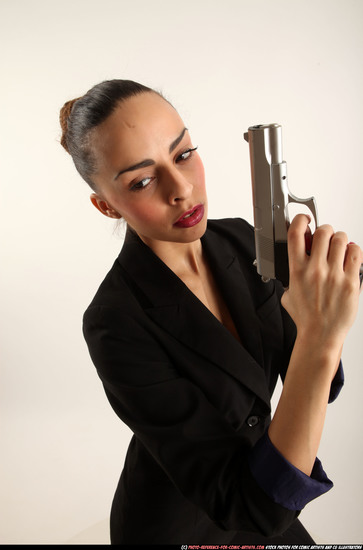 Woman Young Athletic White Fighting with gun Standing poses Business