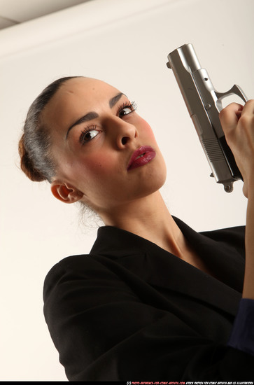 Woman Young Athletic White Fighting with gun Standing poses Business