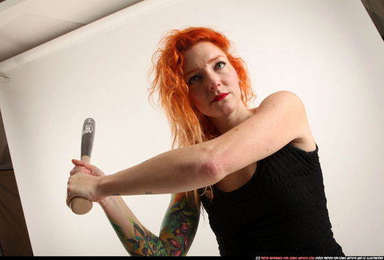 Woman Adult Athletic White Standing poses Casual Fighting with bat