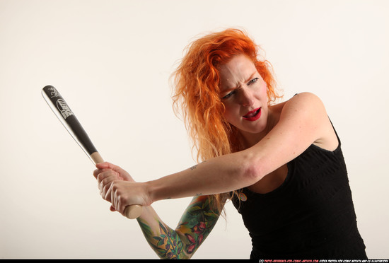 Woman Adult Athletic White Standing poses Casual Fighting with bat