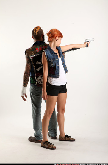 Man & Woman Adult Athletic White Standing poses Casual Fighting with shotgun