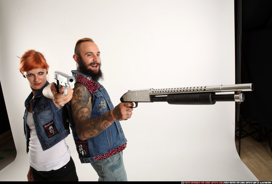 Man & Woman Adult Athletic White Standing poses Casual Fighting with shotgun