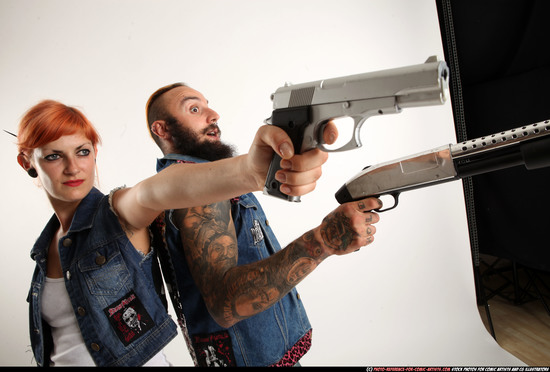 Man & Woman Adult Athletic White Standing poses Casual Fighting with shotgun