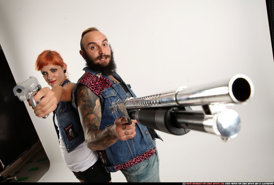 Man & Woman Adult Athletic White Standing poses Casual Fighting with shotgun