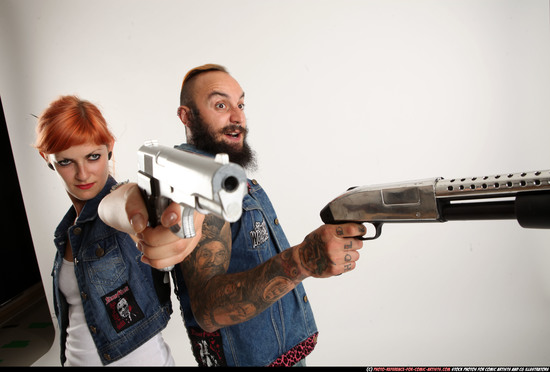 Man & Woman Adult Athletic White Standing poses Casual Fighting with shotgun