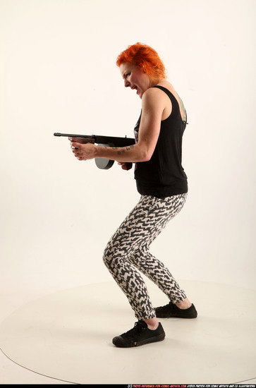 Woman Adult Athletic White Fighting with submachine gun Standing poses Casual