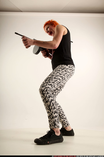 Woman Adult Athletic White Fighting with submachine gun Standing poses Casual