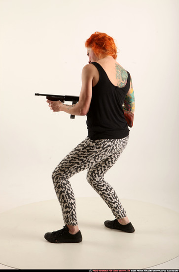 Woman Adult Athletic White Fighting with submachine gun Standing poses Casual