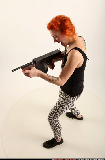 Woman Adult Athletic White Fighting with submachine gun Standing poses Casual