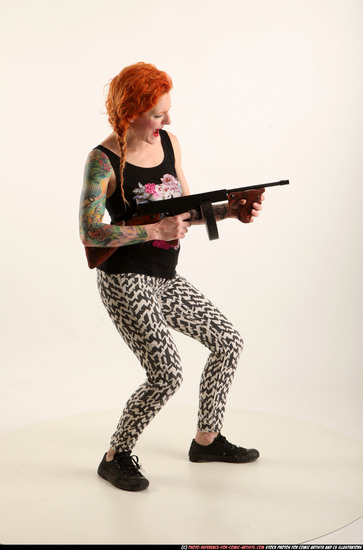 Woman Adult Athletic White Fighting with submachine gun Standing poses Casual