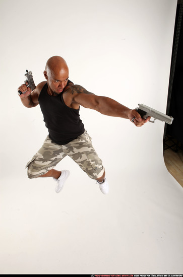 Man Adult Athletic Black Fighting with gun Moving poses Sportswear