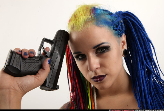 Woman Young Average White Fighting with gun Sitting poses Casual