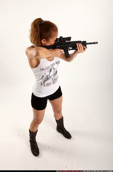 Woman Adult Athletic White Fighting with submachine gun Standing poses Casual