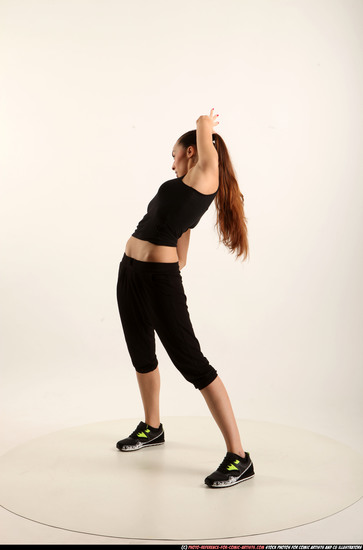 Woman Young Athletic White Fighting with gun Standing poses Business