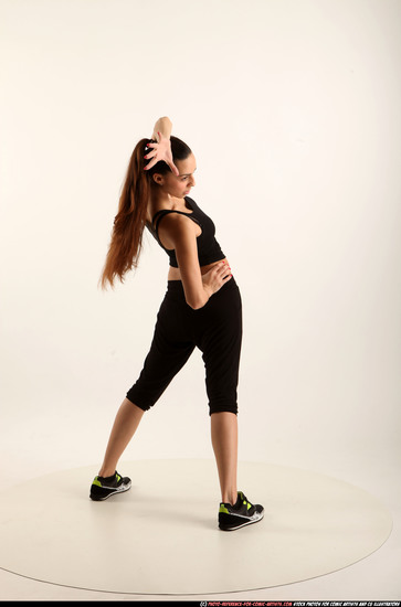 Woman Young Athletic White Fighting with gun Standing poses Business