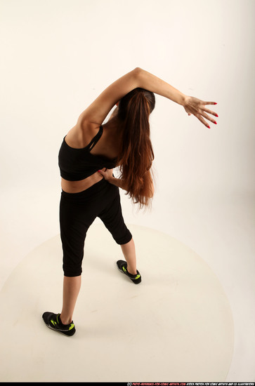 Woman Young Athletic White Fighting with gun Standing poses Business