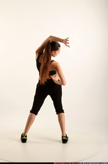 Woman Young Athletic White Fighting with gun Standing poses Business