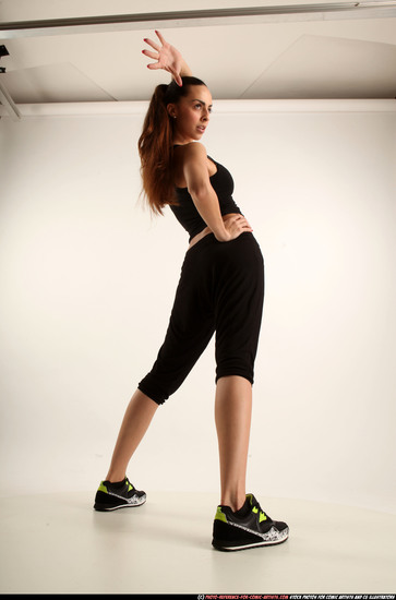 Woman Young Athletic White Fighting with gun Standing poses Business