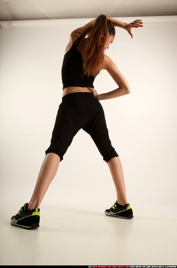 Woman Young Athletic White Fighting with gun Standing poses Business