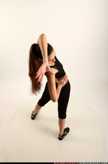 Woman Young Athletic White Fighting with gun Standing poses Business