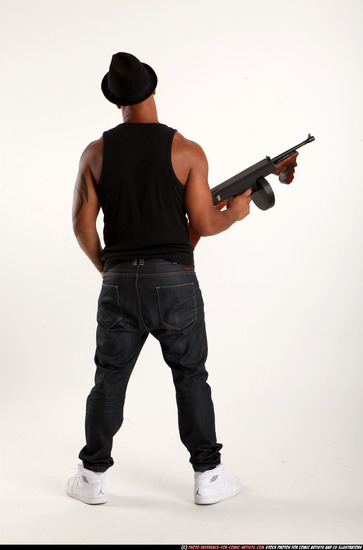 Man Adult Athletic Black Fighting with submachine gun Standing poses Casual